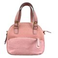 Bolso hipy rosado.